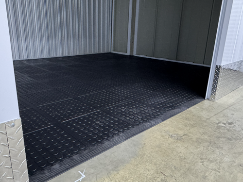 Completed Dura Tile PVC interlocking floor installation in a garage