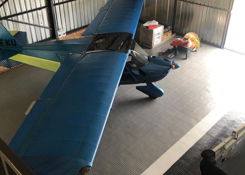 Small aircraft inside a hangar with Dura Tile flooring