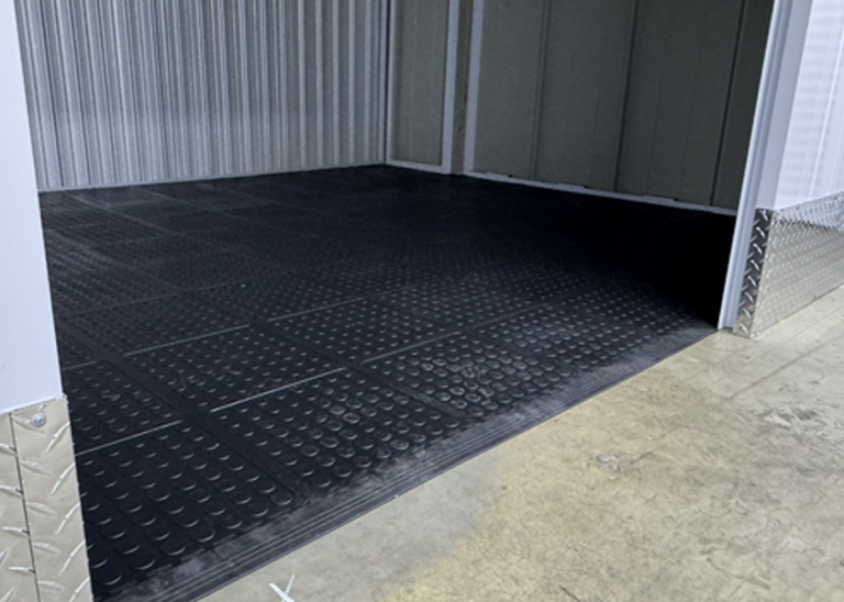 Completed black Dura Tile flooring inside a self storage unit